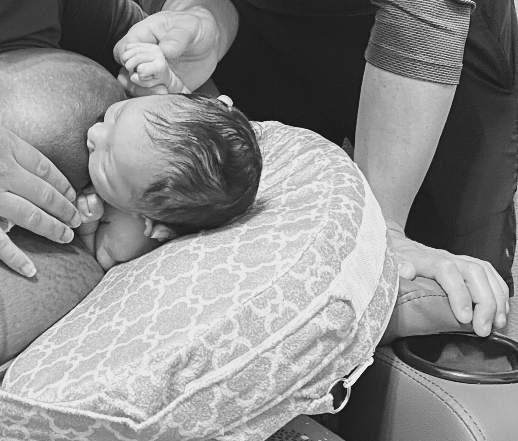 Newborn latching during a breastfeeding support session