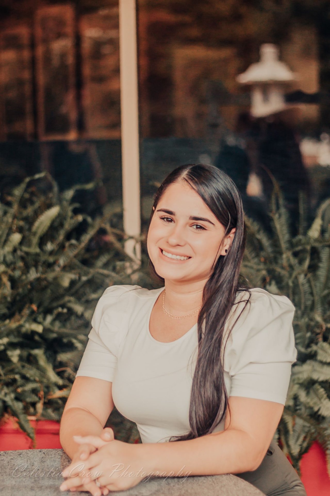 Isamarys Medina Rivera, birth and postpartum doula, smiling outdoors